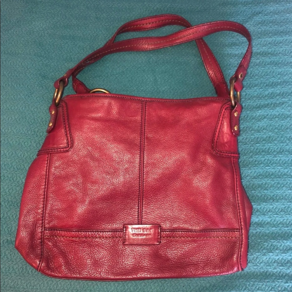 Red leather purse from The Sak